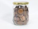 Glass med diverse mynt