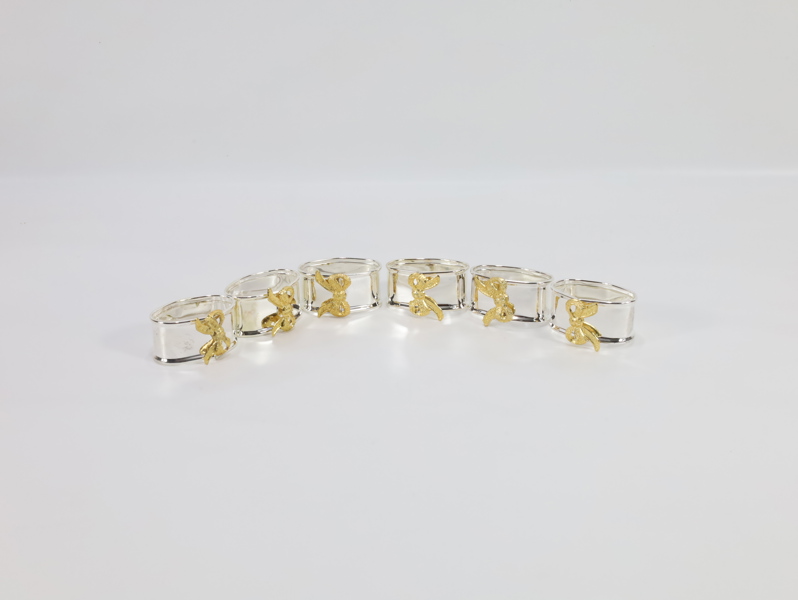 Serviettringer i metall med gullfargede sløyfer – sett á 6
