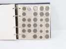 Myntalbum med diverse mynt