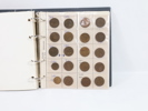 Myntalbum med diverse mynt