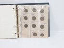 Myntalbum med diverse mynt