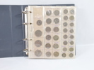 Myntalbum med diverse mynt