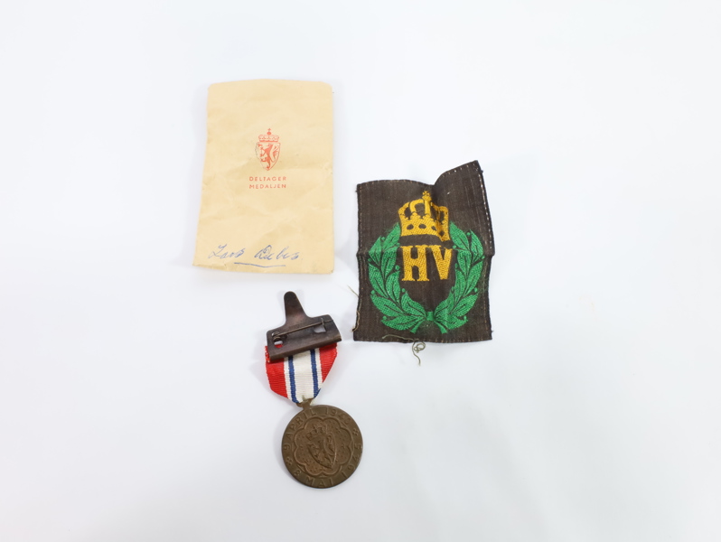 Deltagermedaljen 1940–1945 med original etui og HV-merke
