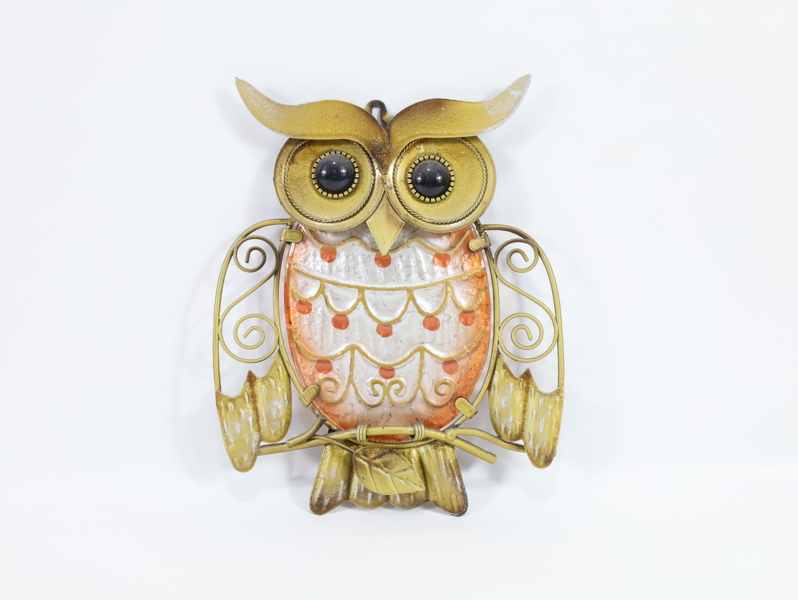 Dekorativ ugle i metall og glass – veggdekor
