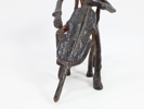 Vintage skulptur i jern – Musiker med cello, ca. midten av 1900-tallet