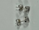 Øredobber i 14 karat hvitt gull med diamanter
