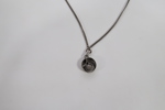 Halskjede i sølv 925 med anheng og mørk stein