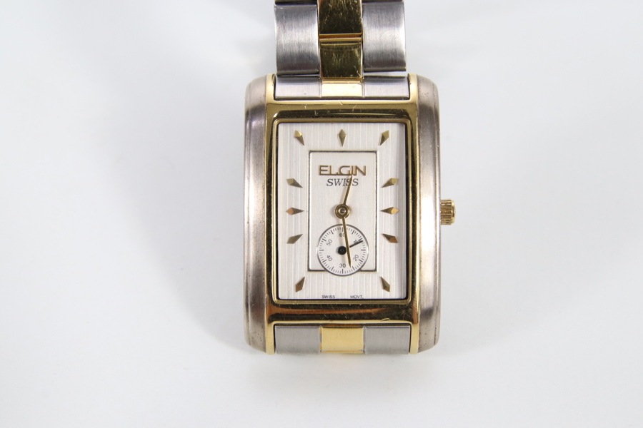 Elgin Swiss rektangulær klokke i stål og gulltone, ca. 28 mm
