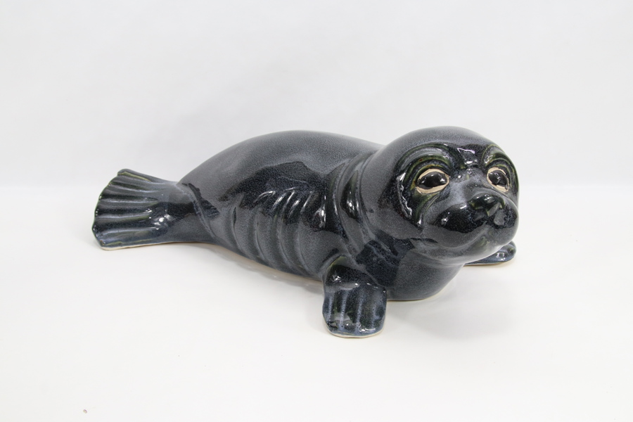 Dekorativ sel i keramikk