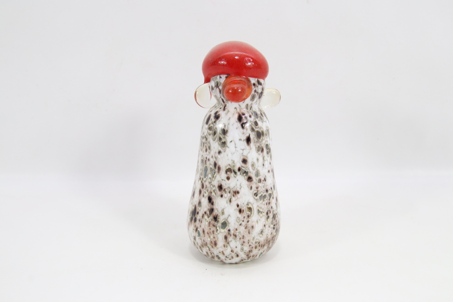 Glassfigur formet som nisse