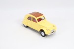 Dinky Toys utstillingshylle med modellbiler
