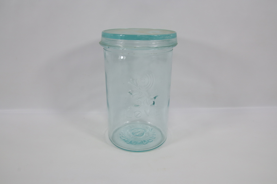 Glasskrukke med løvemotiv
