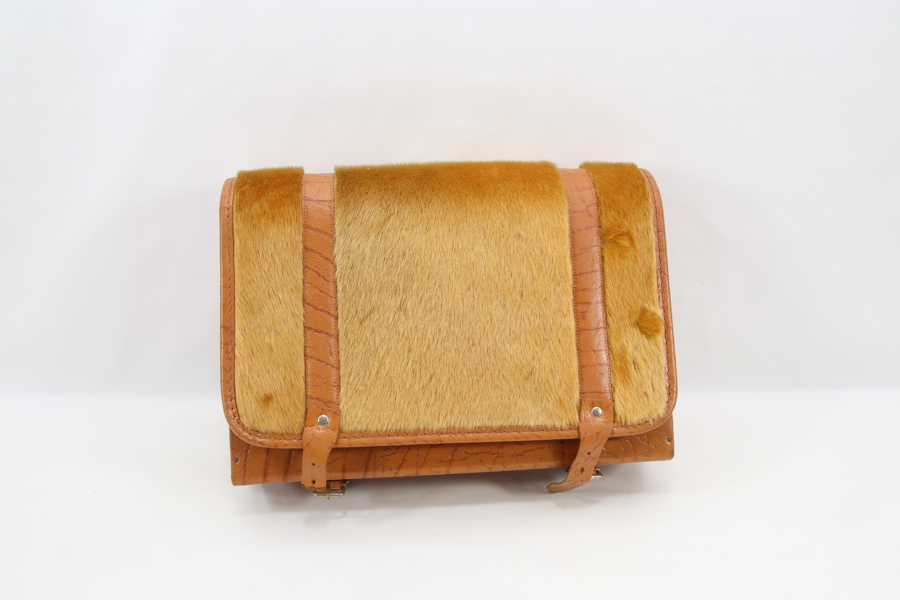 Vintage ryggsekk i skinn og pels
